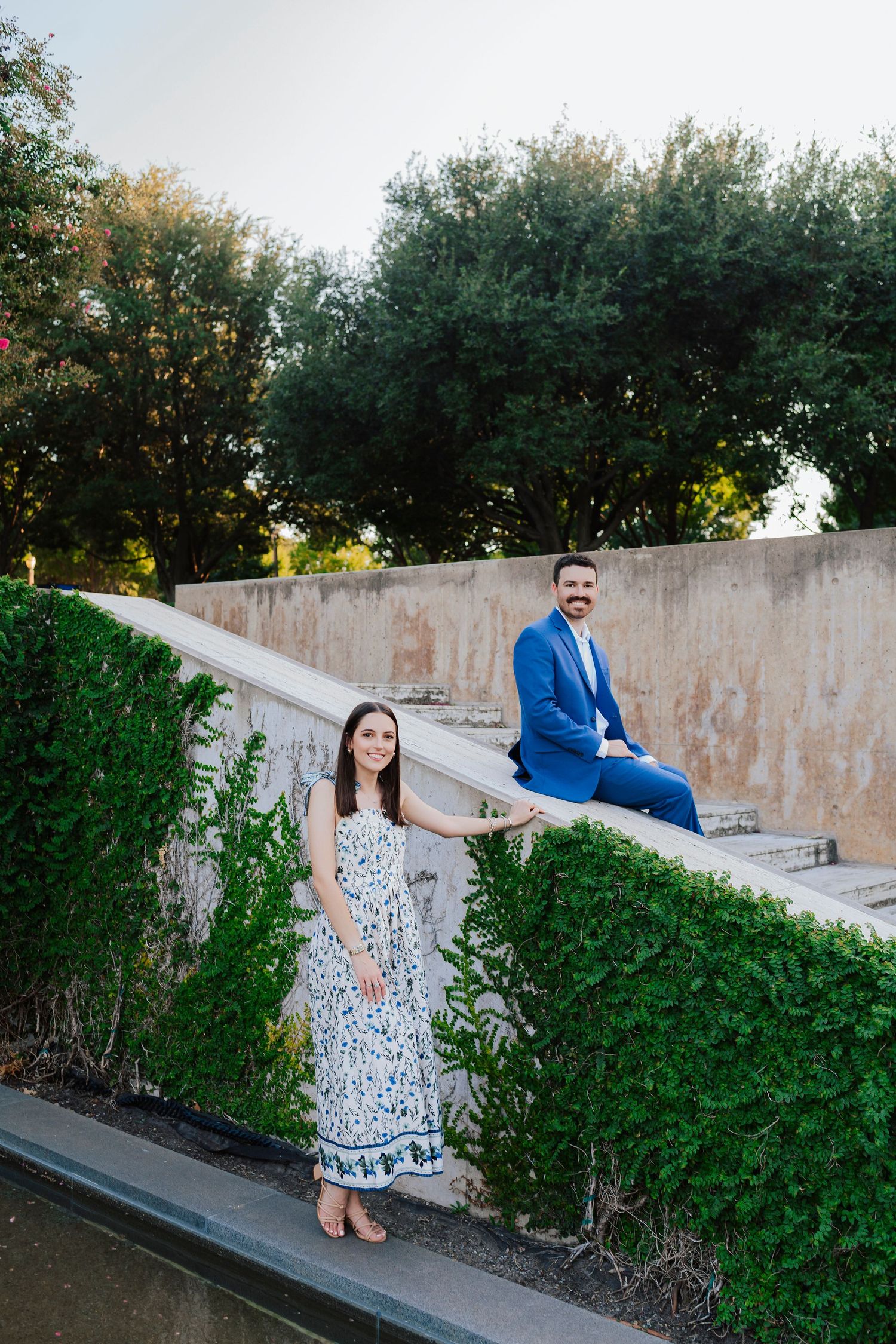 “Couple posing in front of the Kimbell Art Museum in Fort Worth during engagement session