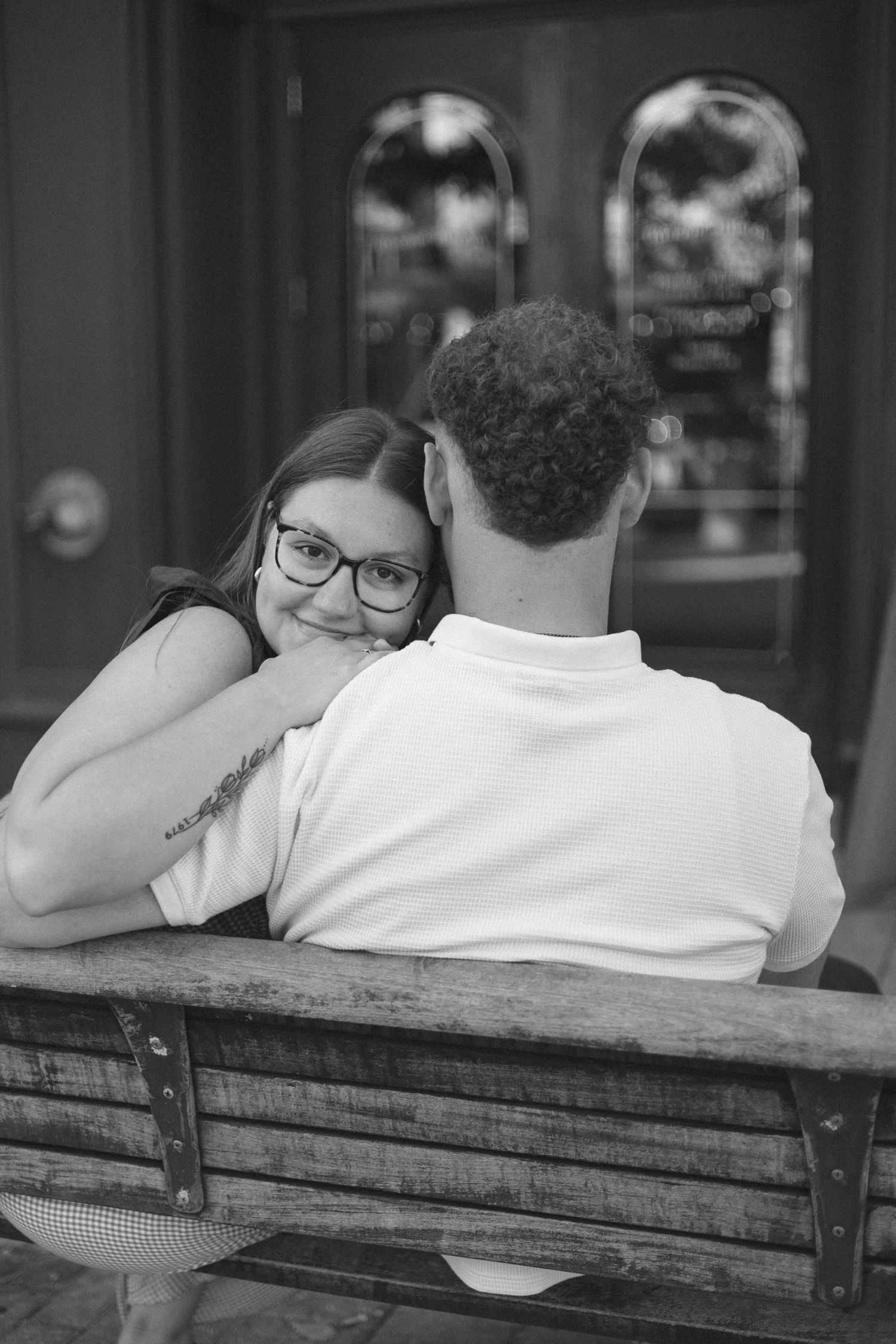 Outdoor uptown Normal summer engagement photos in Normal, Illinois