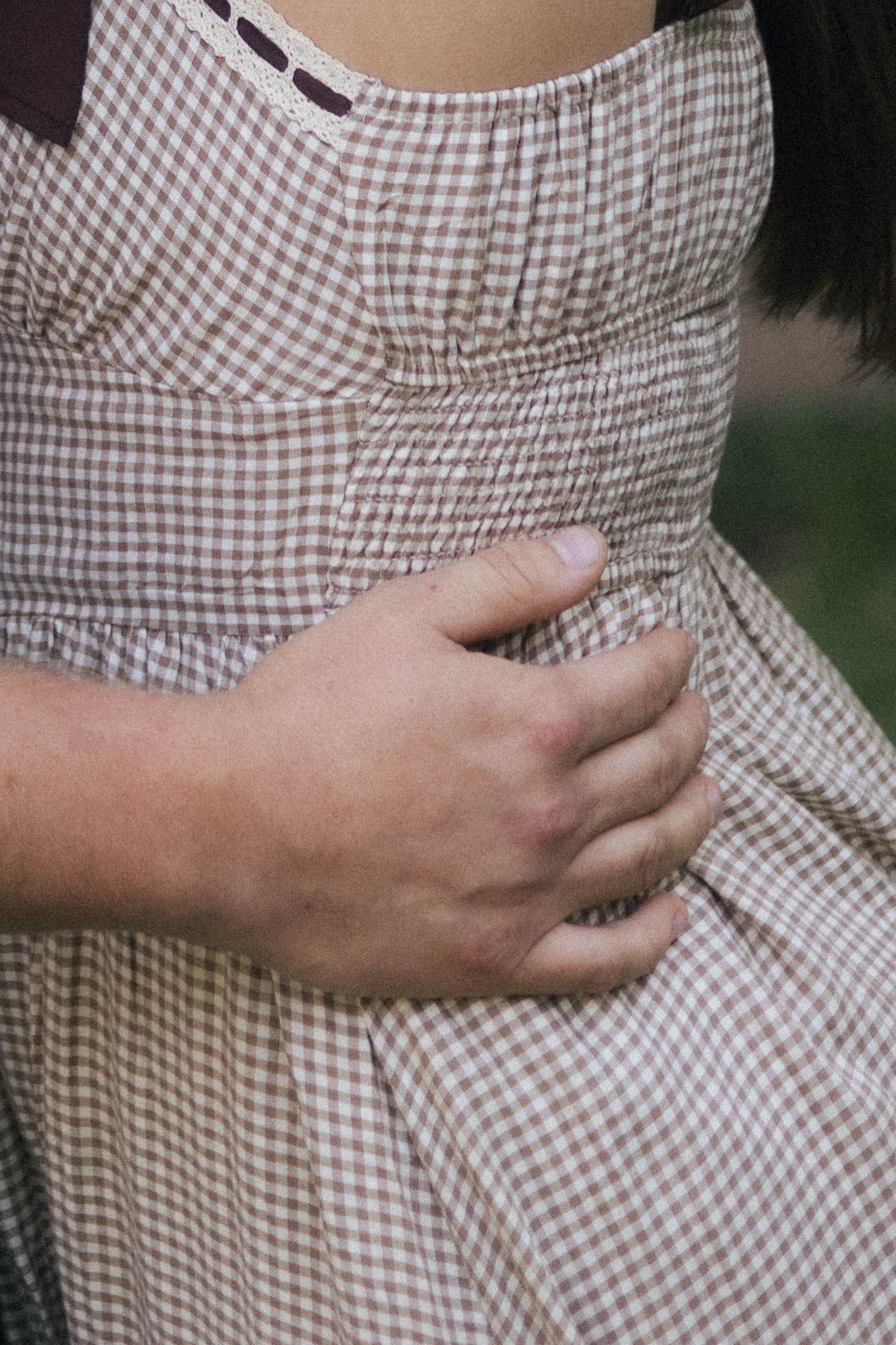 Outdoor uptown Normal summer engagement photos in Normal, Illinois