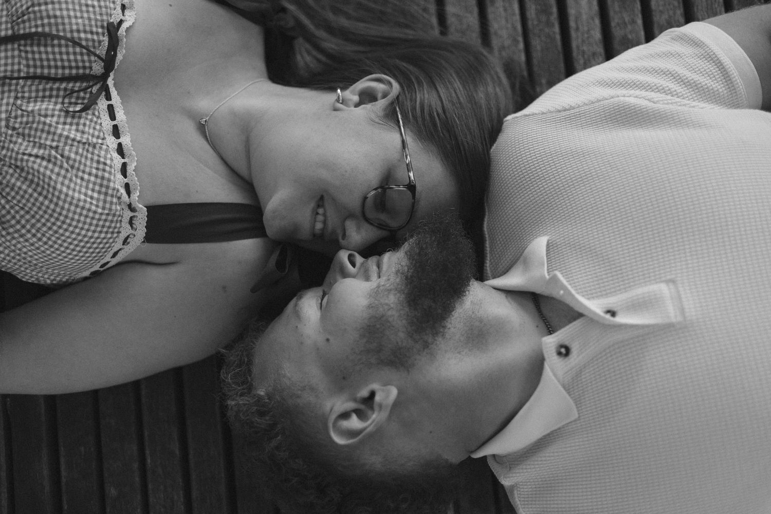 Outdoor uptown Normal summer engagement photos in Normal, Illinois