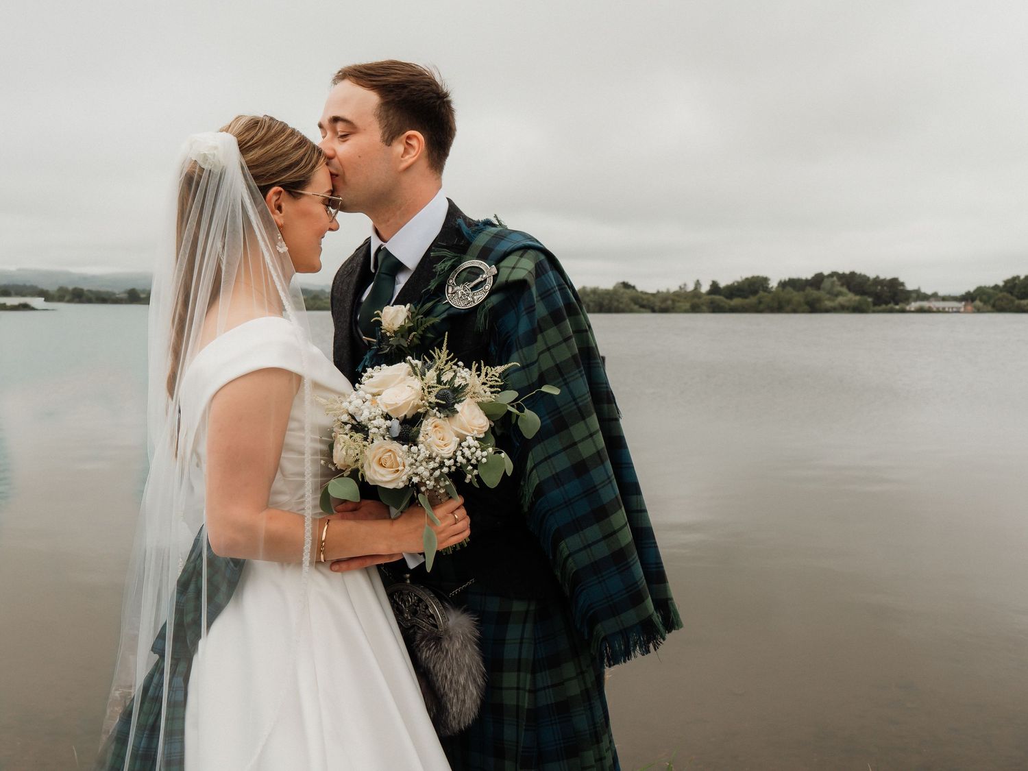 Romantic engagement portrait of couple in Princes' street gardens, Edinburgh by Edinburgh couples photographer