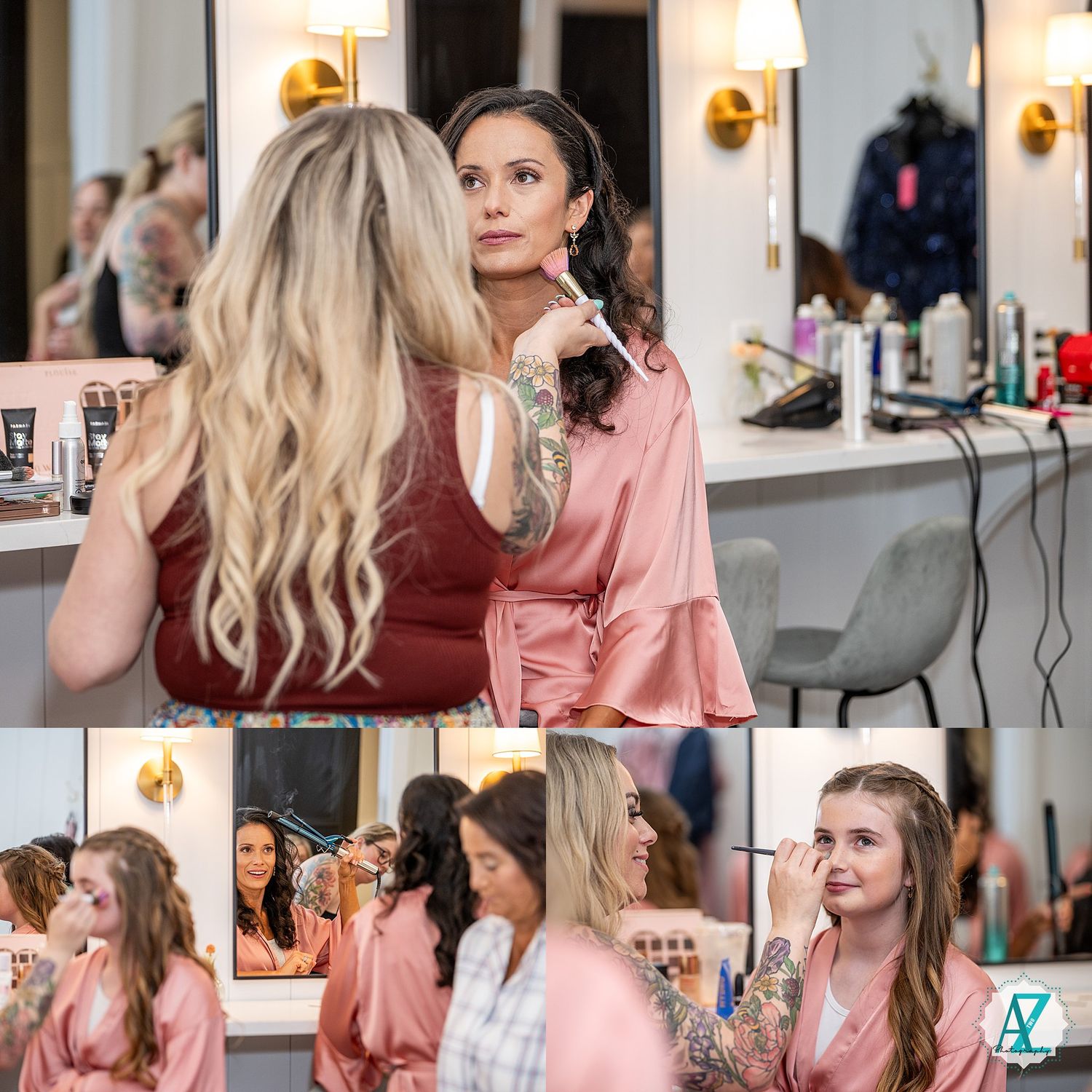 Women in pink and burgundy outfits having their hair styled and getting ready in a bright salon setting.