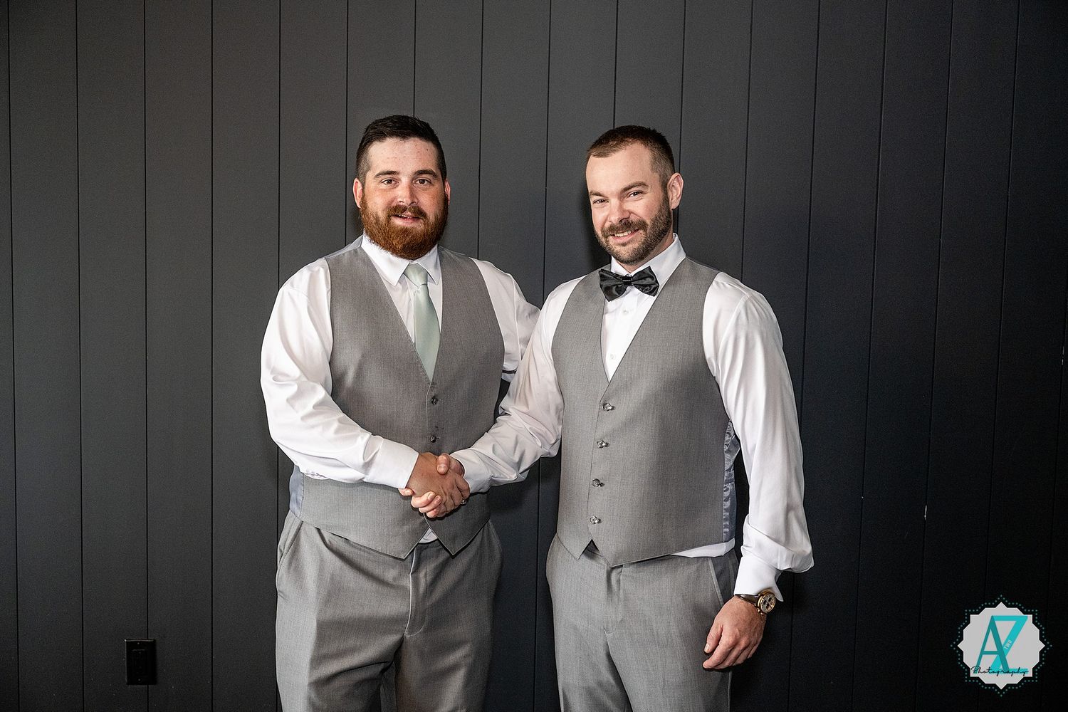 Two people wearing gray vests and white shirts pose together in a series of black and white wedding photos.