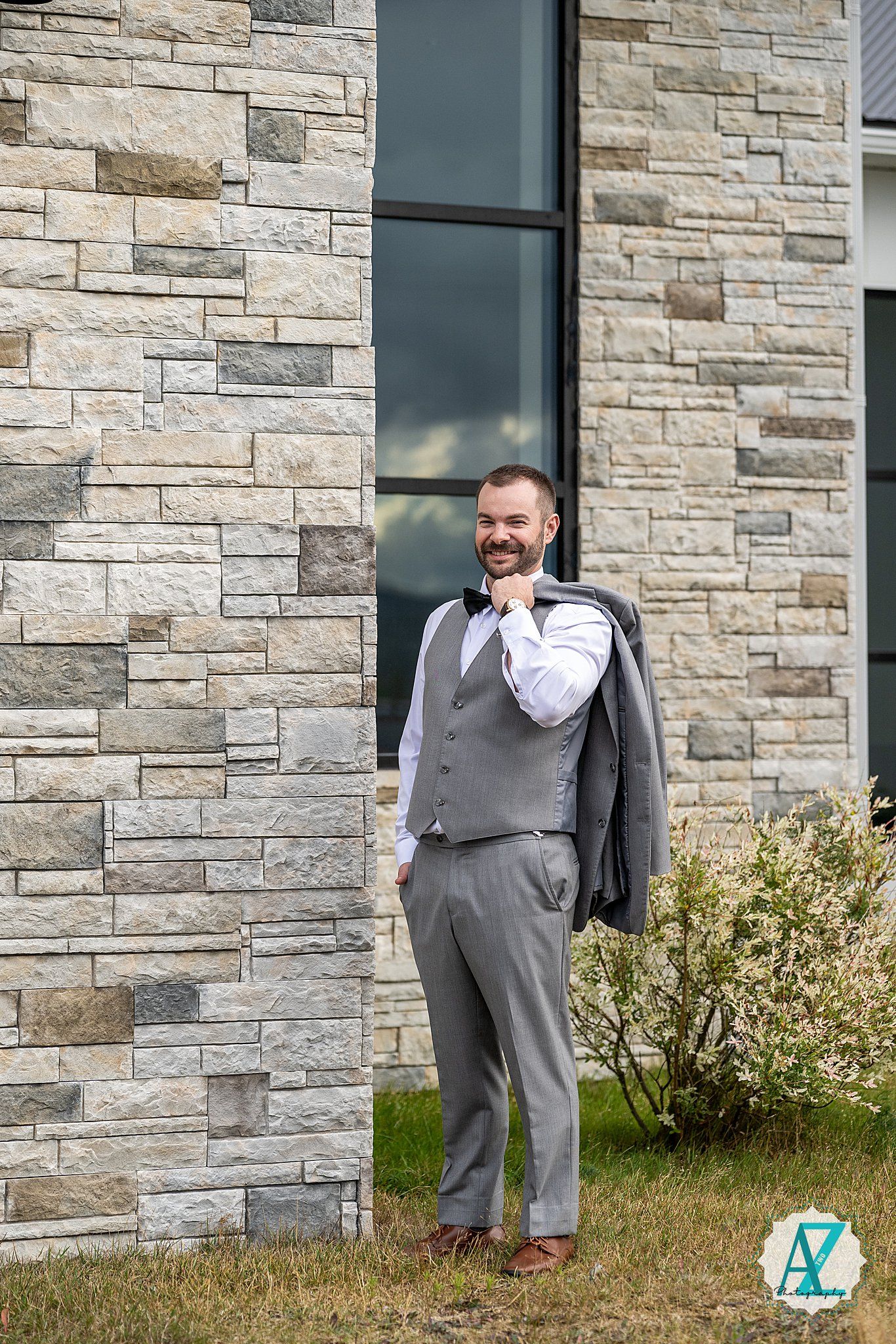 Three connected images show someone holding up professional attire outside a modern stone building.