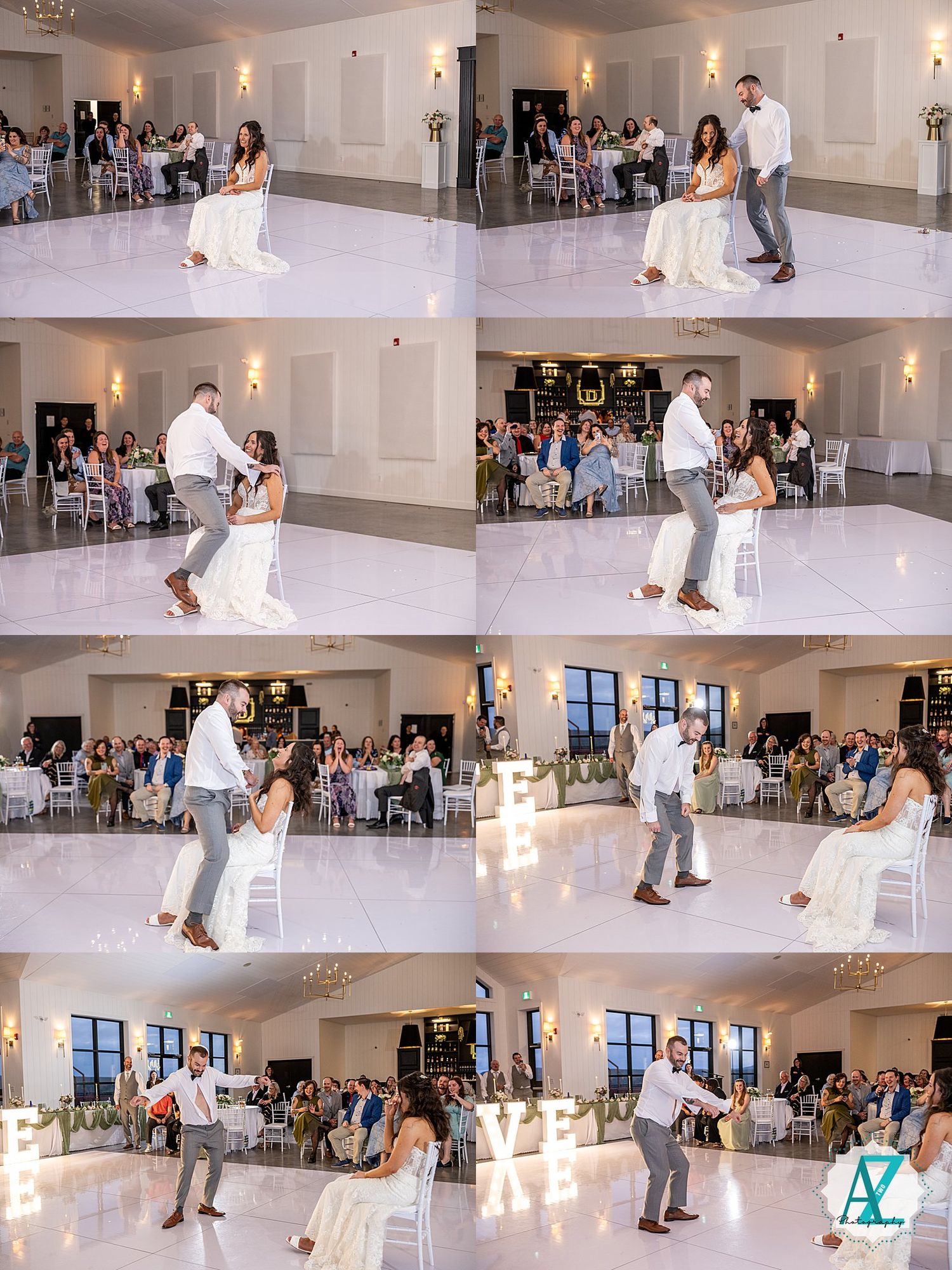 Reception guests watch a couple perform an energetic dance routine on a white dance floor in an elegant ballroom.