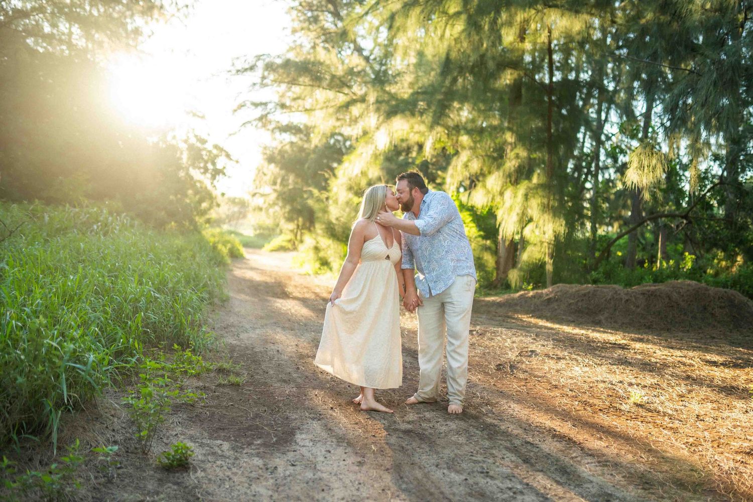 Maui couple photographer photo against beautiful Maui sunset beach by ohwowfotos.