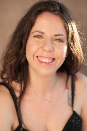 Series of candid smiling expressions with tousled dark hair against warm lighting.