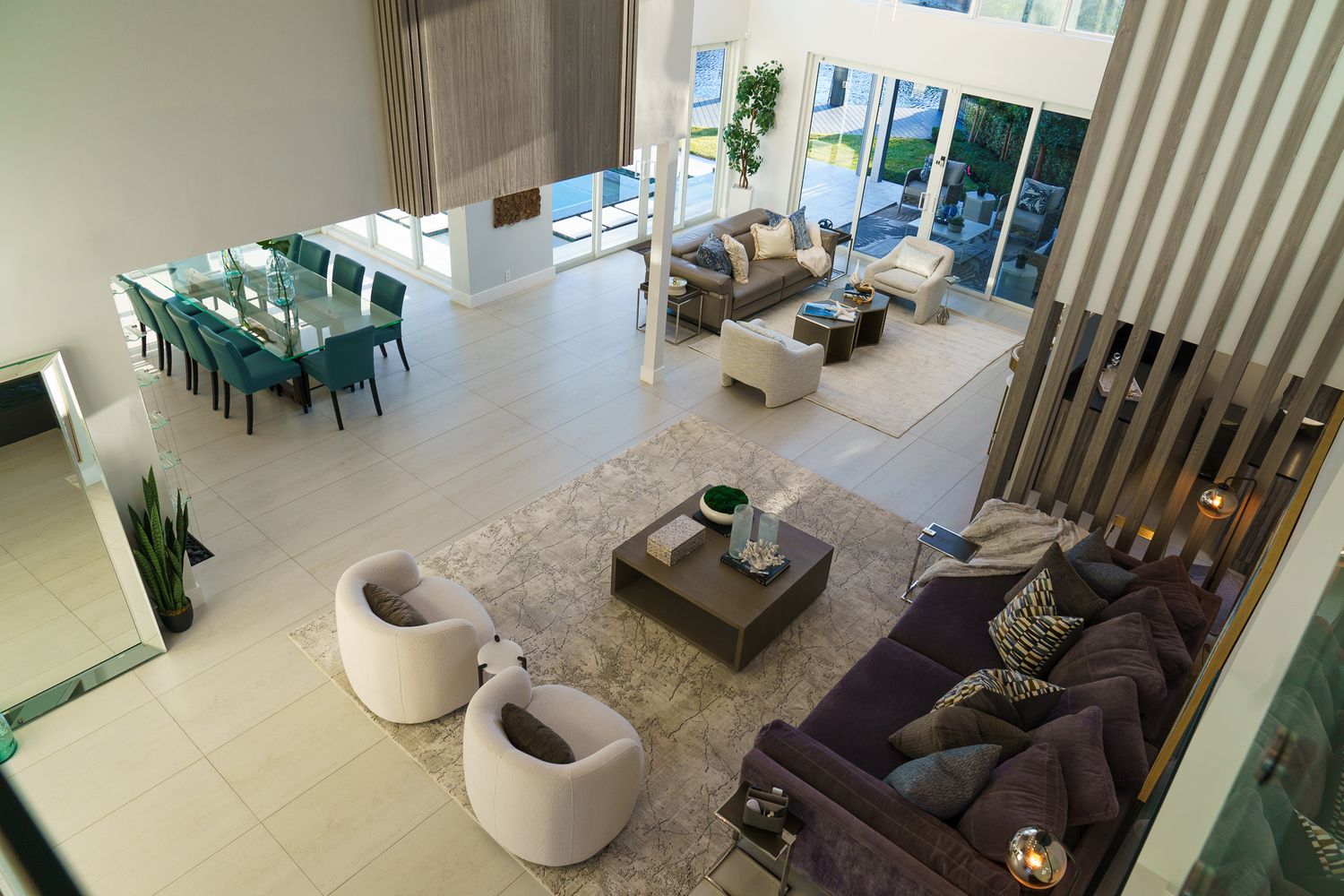 Bright, inviting interior of a South Florida home with wide-angle view and natural light, professional real estate listing photo by SRX Med
