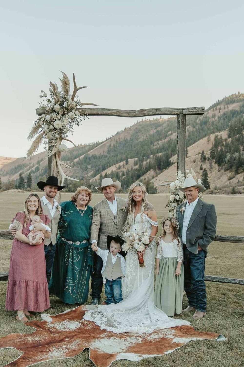 Joyful moments from wedding reception in rustic wedding barn at the American Homestead. Photographed by a spokane wedding photographer