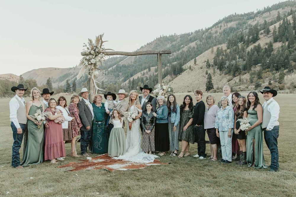 Joyful moments from wedding reception in rustic wedding barn at the American Homestead. Photographed by a spokane wedding photographer