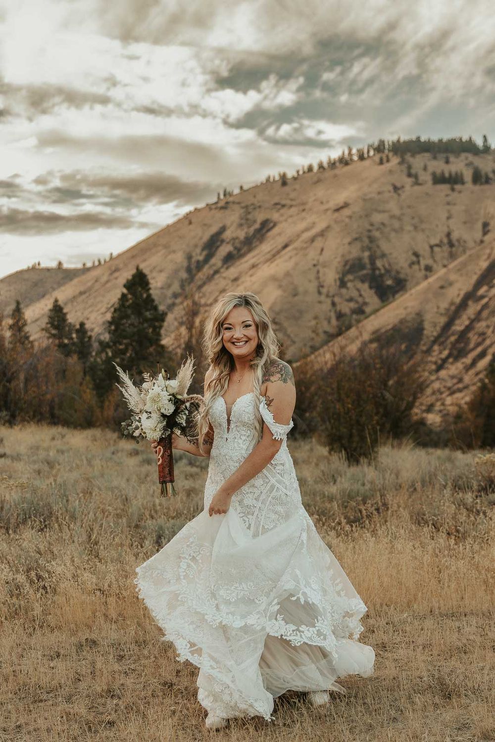Soft, natural light highlights the bride’s radiant beauty in this candid wedding portrait. Captured by a Yakima wedding photographer