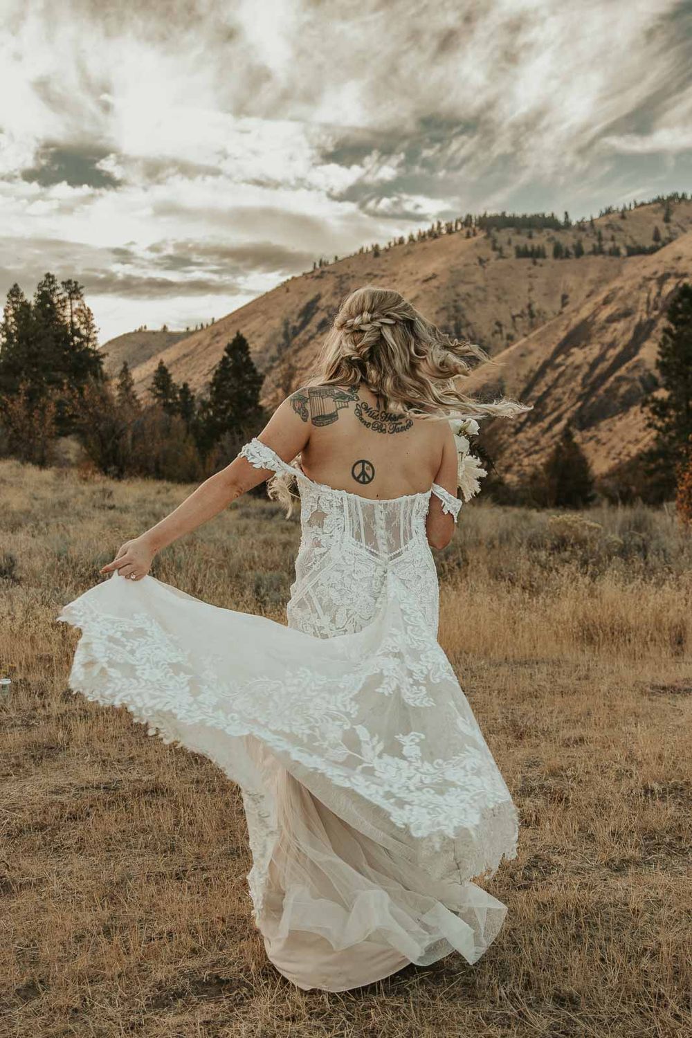 Soft, natural light highlights the bride’s radiant beauty in this candid wedding portrait. Captured by a Yakima wedding photographer