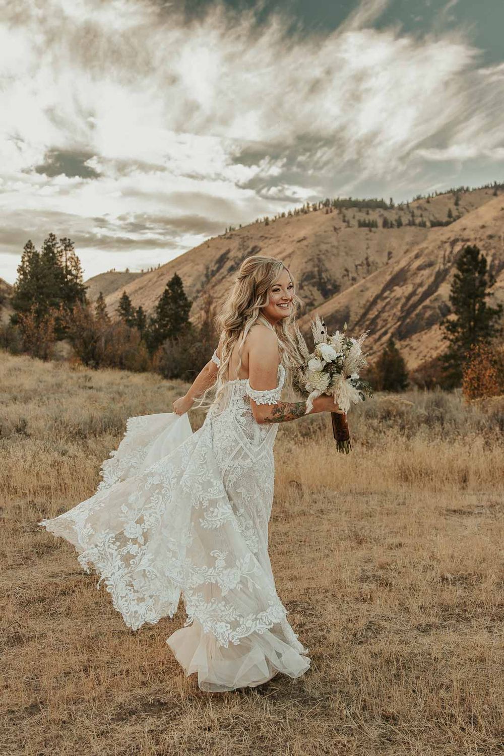 Soft, natural light highlights the bride’s radiant beauty in this candid wedding portrait. Captured by a Yakima wedding photographer