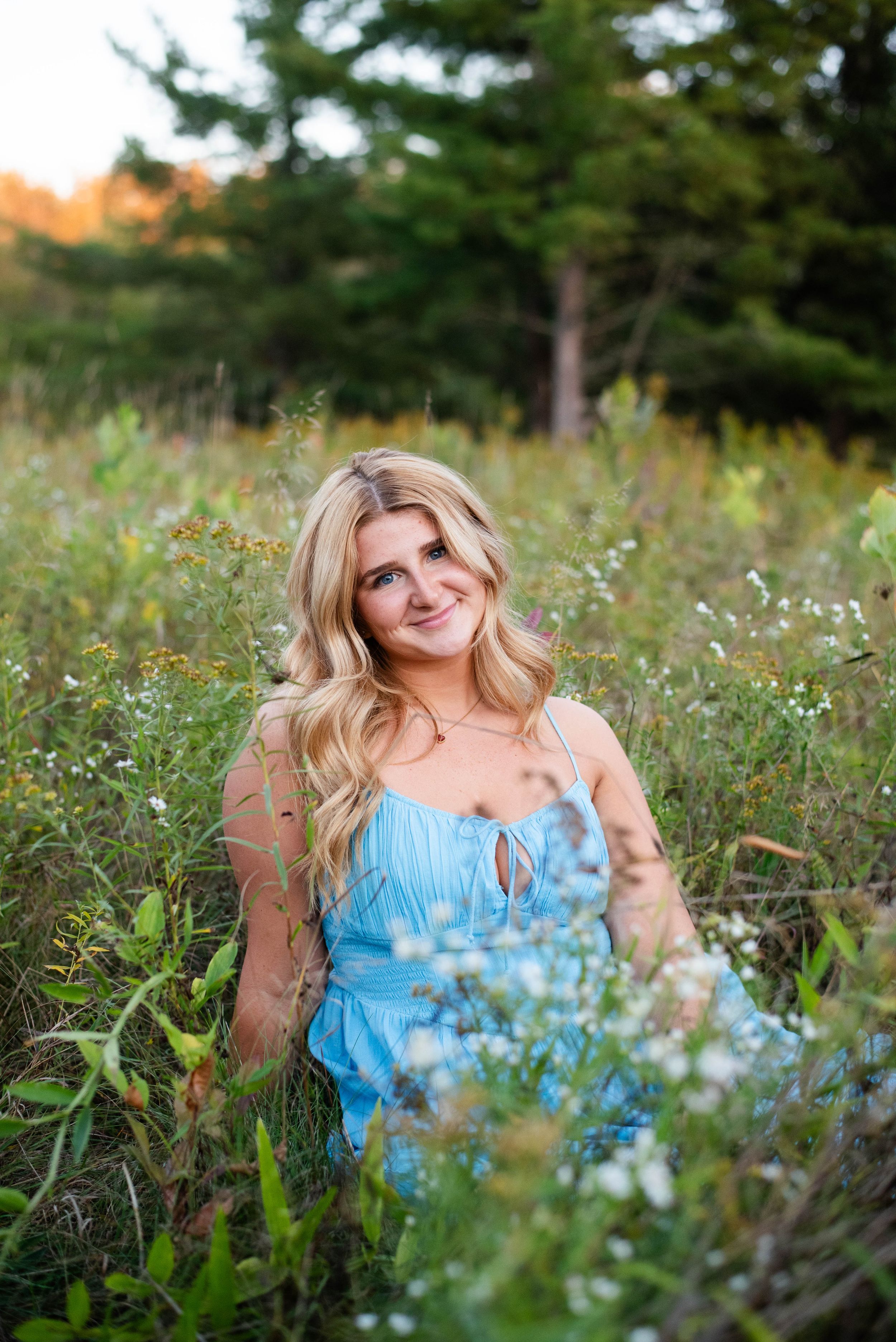 Rochester NY senior poses for photographer