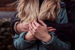 A series of photos showing someone covering their face with their hands in different poses.