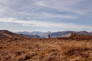 A couple embraces a top of Walla Crag, Keswick