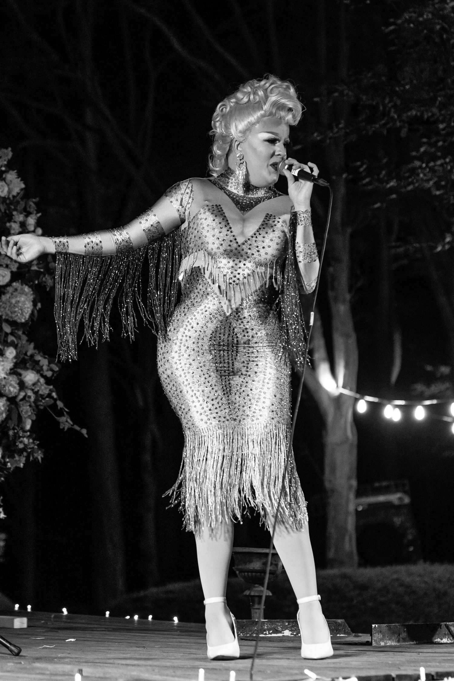 Drag queen singing on stage brighton event photography