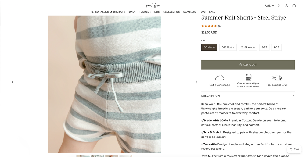 Pregnant woman wearing Summer Knit Shorts in Steel Stripe, featuring a relaxed fit with drawstring waist on a product page.