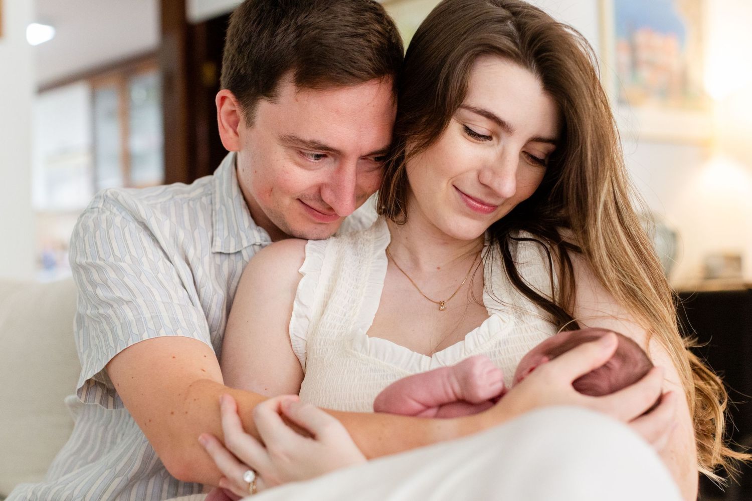 Newborn family portrait. Mom, dad and baby. Guaynabo, Puerto Rico.