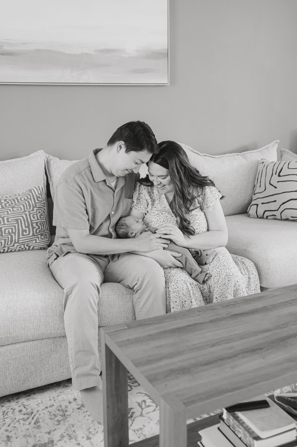 In-home newborn photography in Bedford, VA capturing authentic family moments in a relaxed environment.