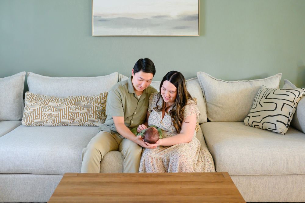In-home newborn photography in Bedford, VA capturing authentic family moments in a relaxed environment.
