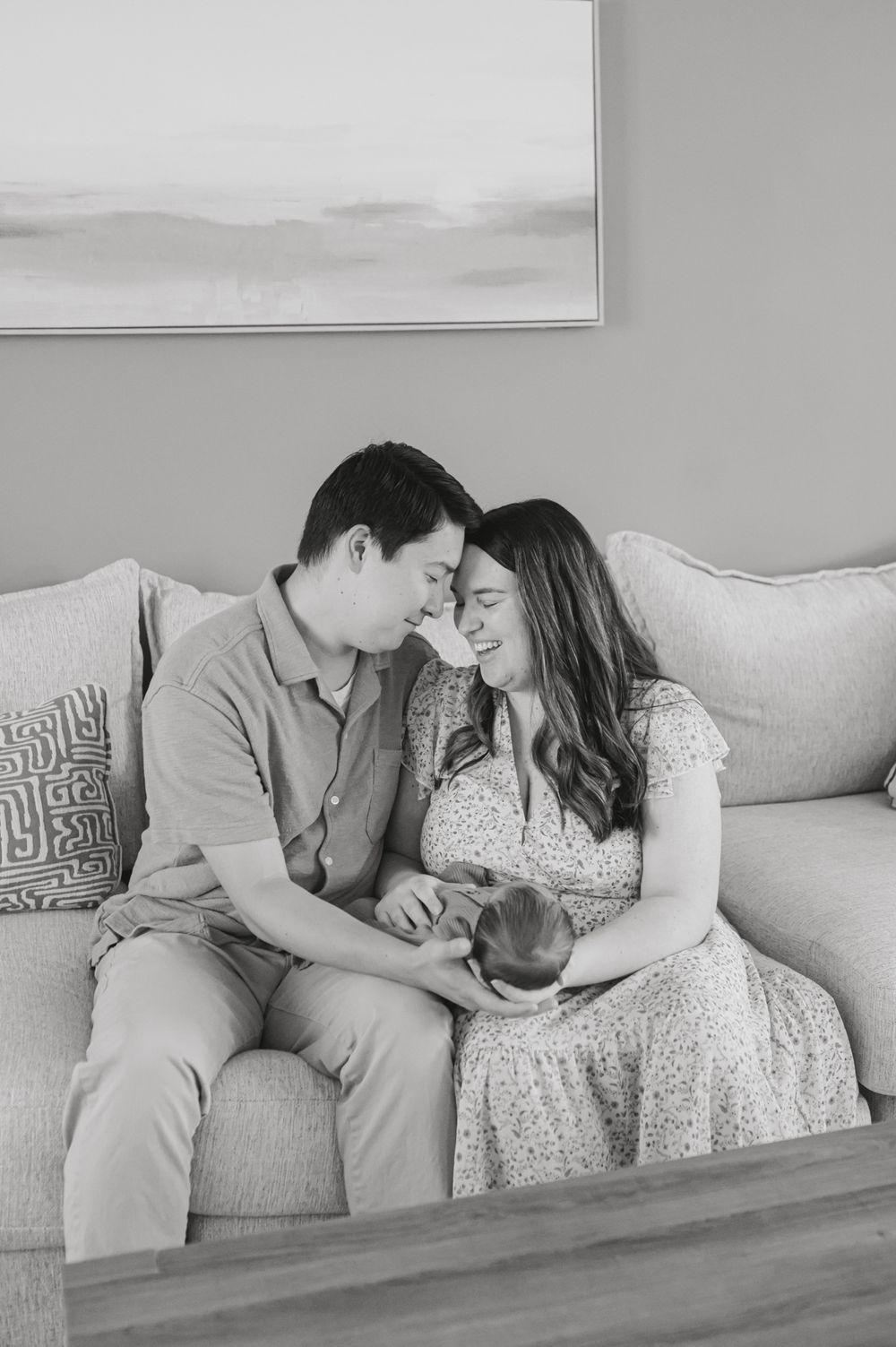In-home newborn photography in Bedford, VA capturing authentic family moments in a relaxed environment.
