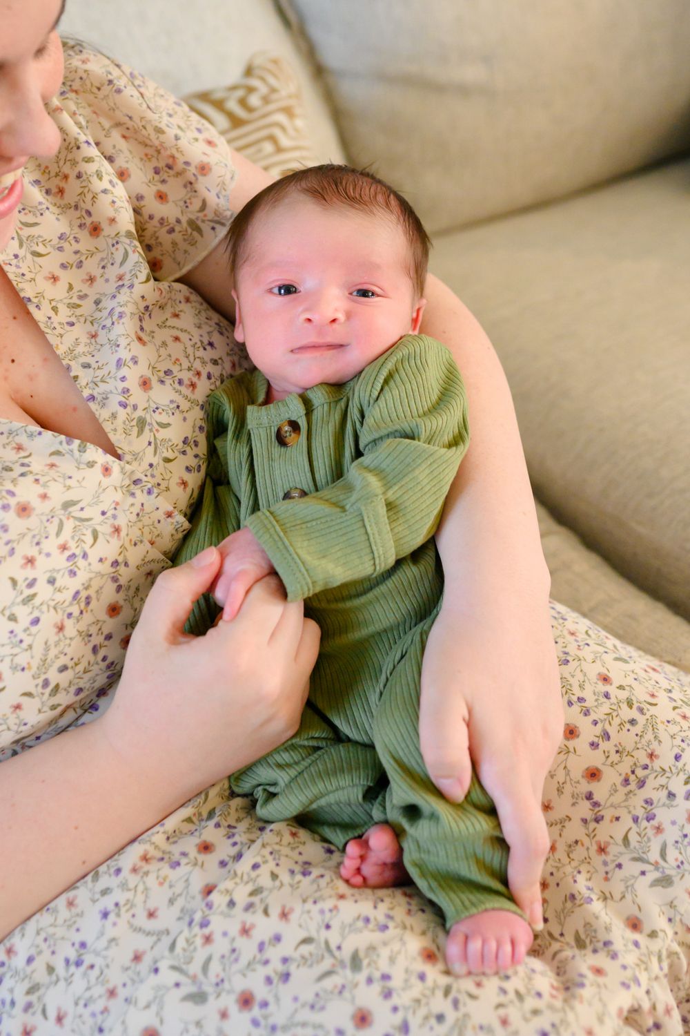 In-home newborn photography in Bedford, VA capturing authentic family moments in a relaxed environment.