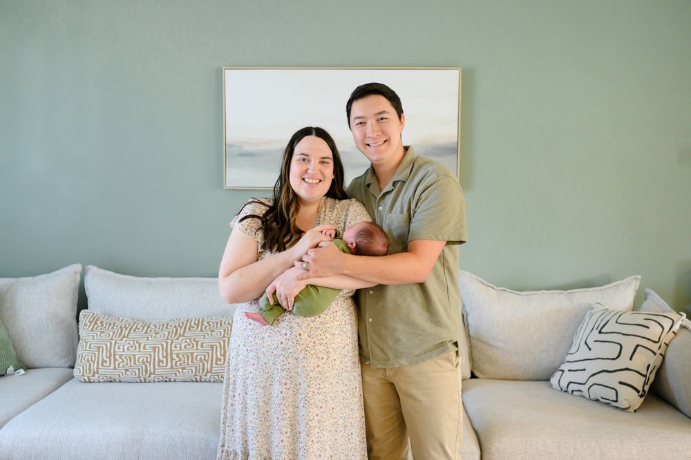 In-home newborn photography in Bedford, VA capturing authentic family moments in a relaxed environment.