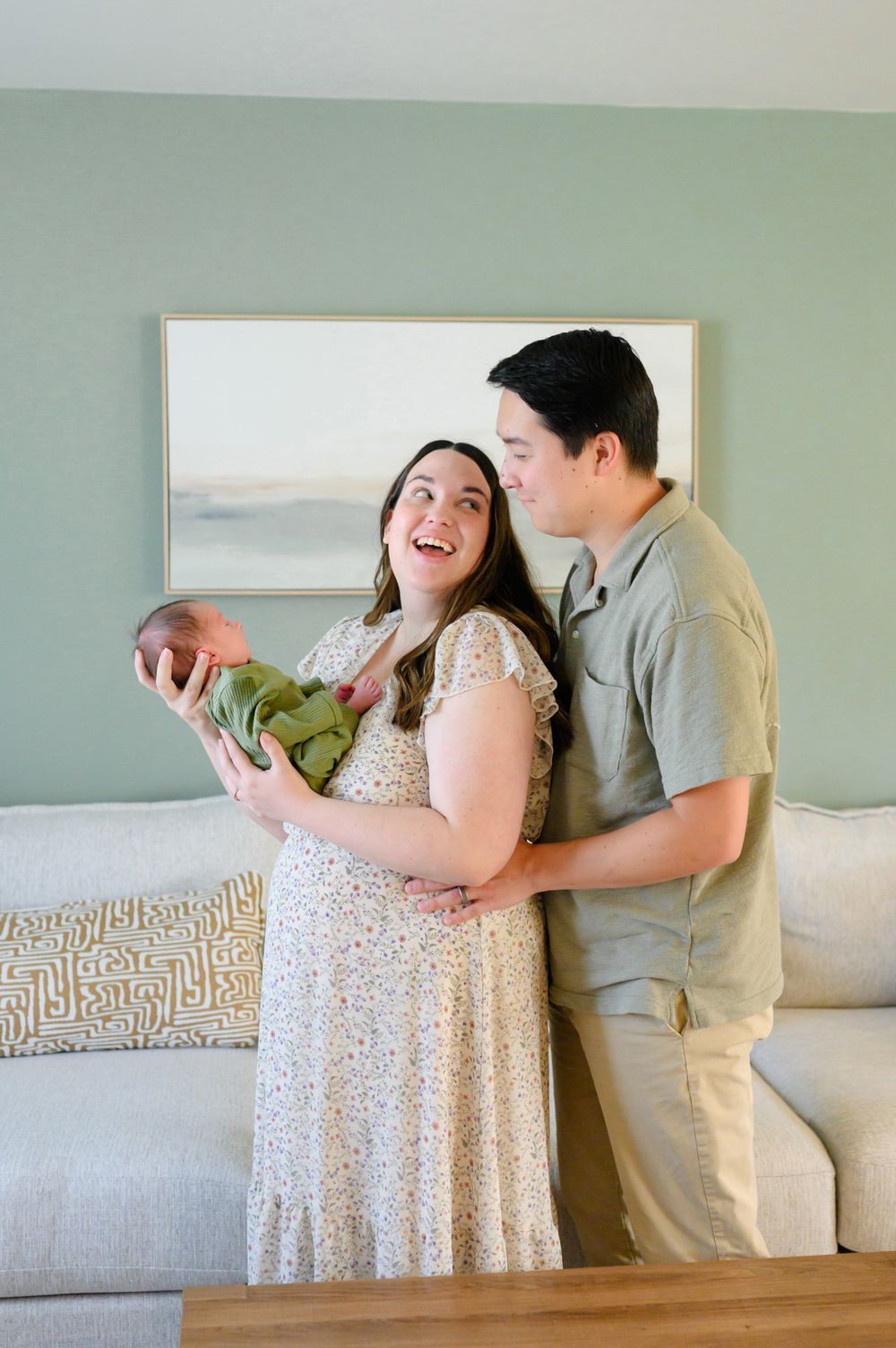 In-home newborn photography in Bedford, VA capturing authentic family moments in a relaxed environment.