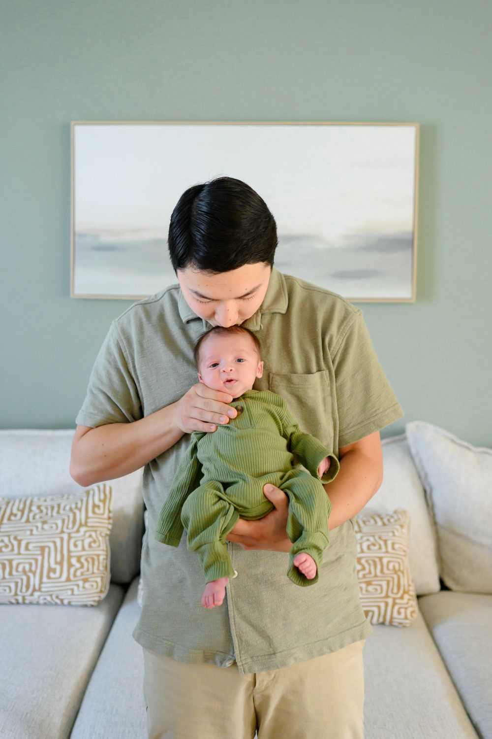 In-home newborn photography in Bedford, VA capturing authentic family moments in a relaxed environment.