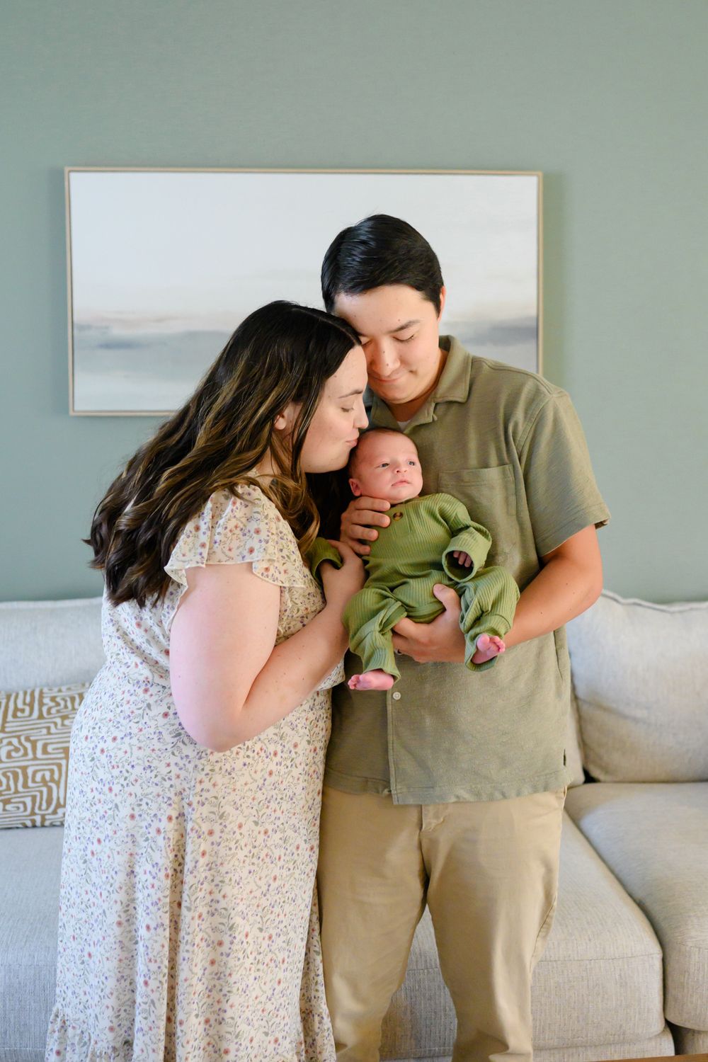 In-home newborn photography in Bedford, VA capturing authentic family moments in a relaxed environment.