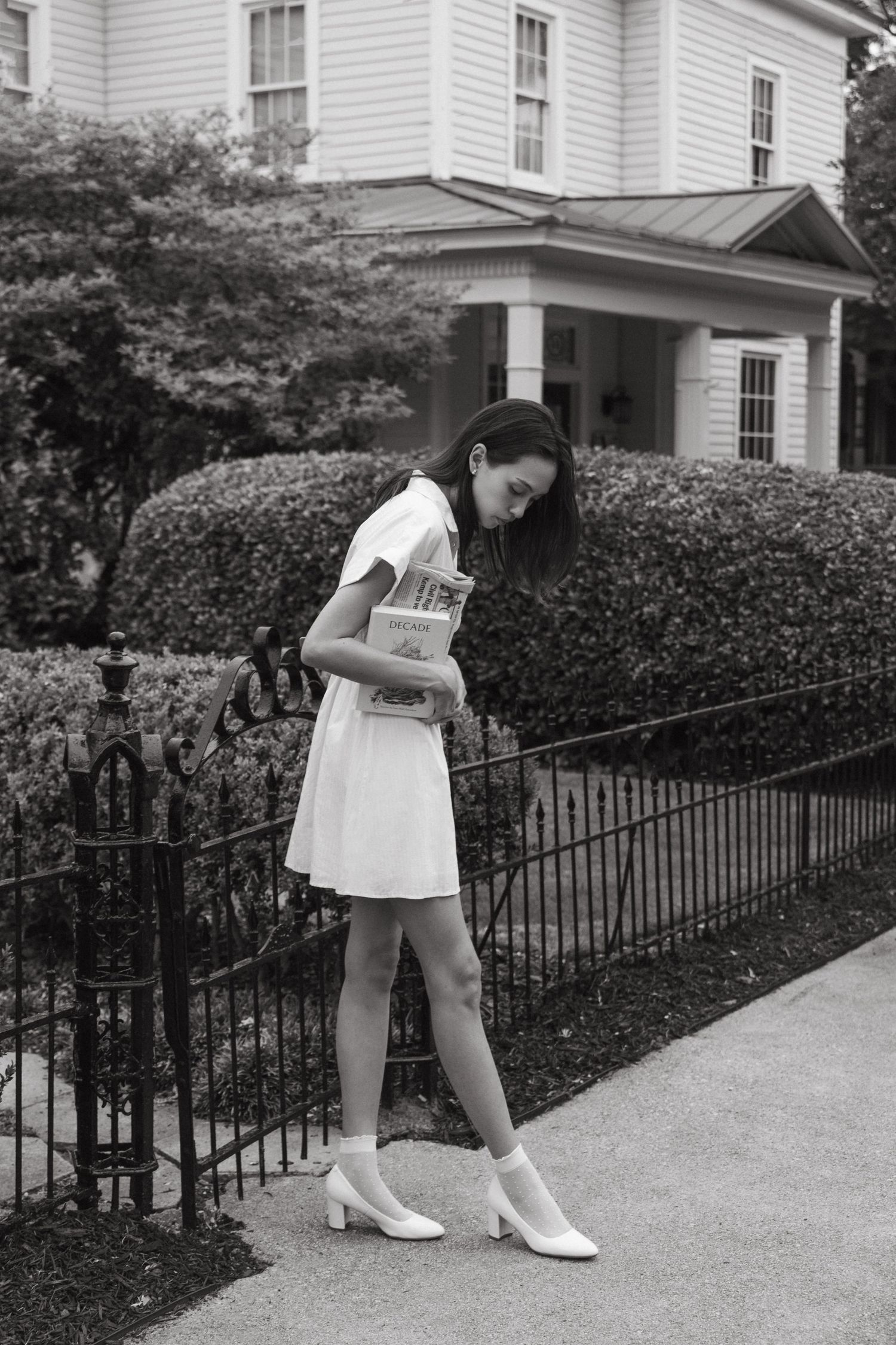 Editorial model standing in front of vintage Atlanta home, Atlanta fashion photography