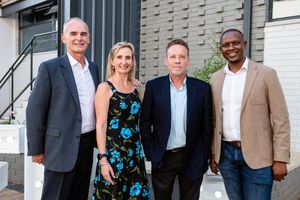 Group portrait of guests attending an event at Emeris Sandton Campus.