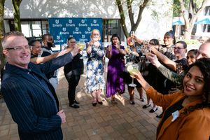 Guests forming a lively celebration line during an event at Emeris Sandton Campus.