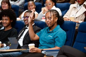 Students engaging with a speaker during the Emeris Sandton Campus Career Evening.