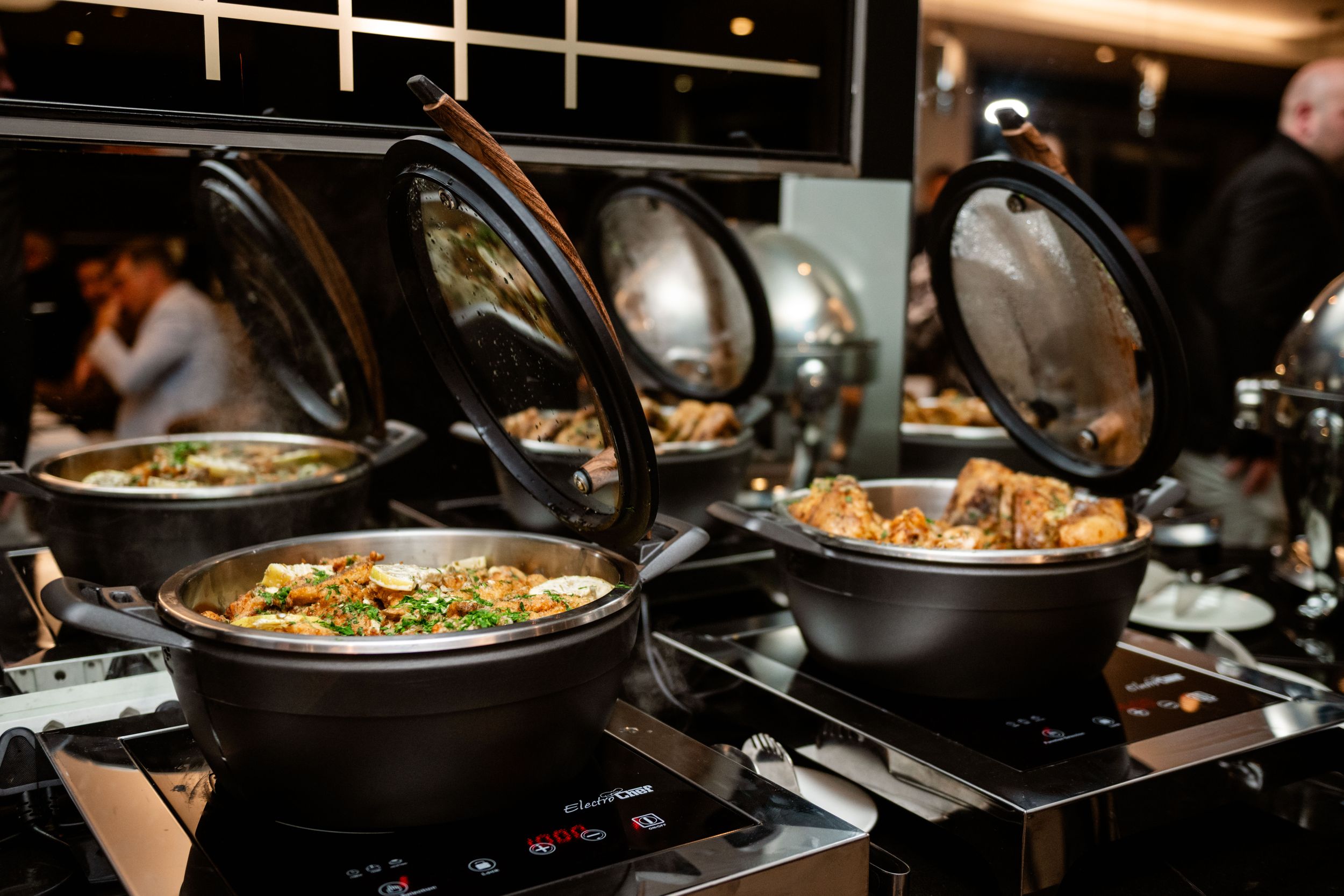 Buffet food display prepared for the Emeris Top Achiever Awards event.