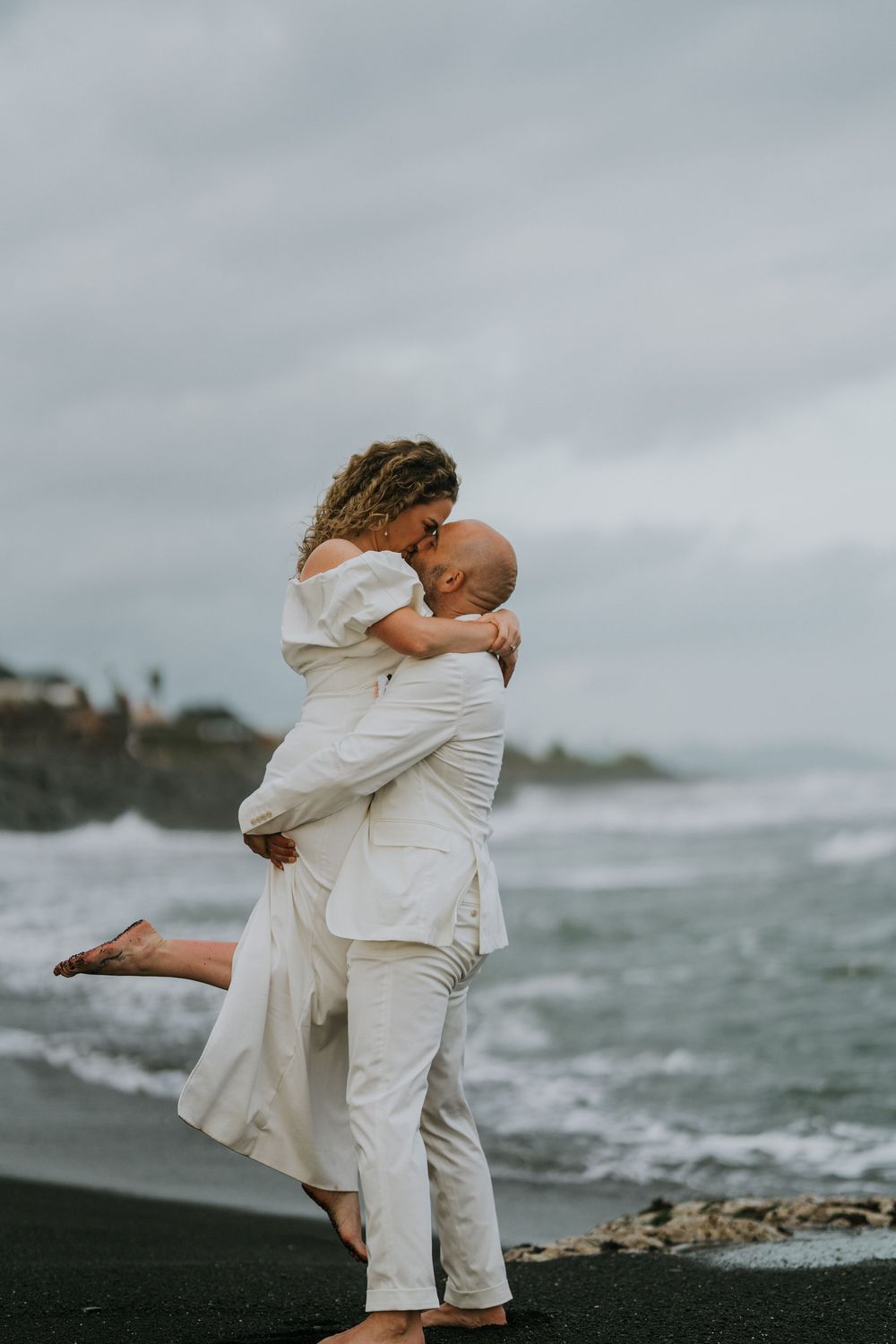 Romantic wedding portraits at The Royal Purnama beachfront resort in Bali.