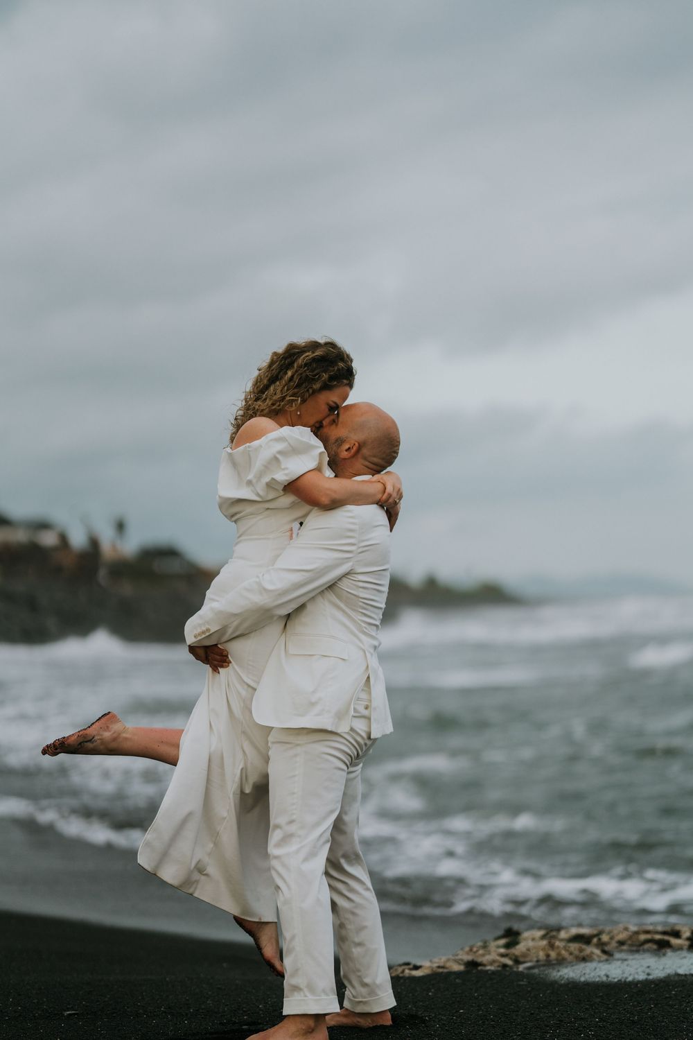 Romantic wedding portraits at The Royal Purnama beachfront resort in Bali.