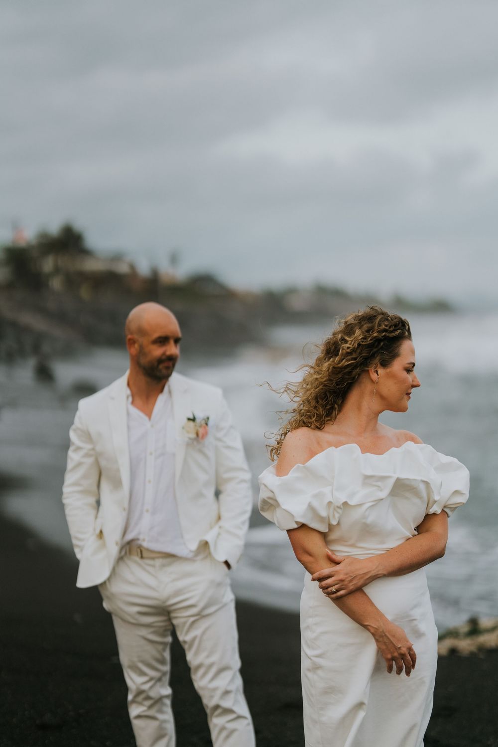 Romantic wedding portraits at The Royal Purnama beachfront resort in Bali.