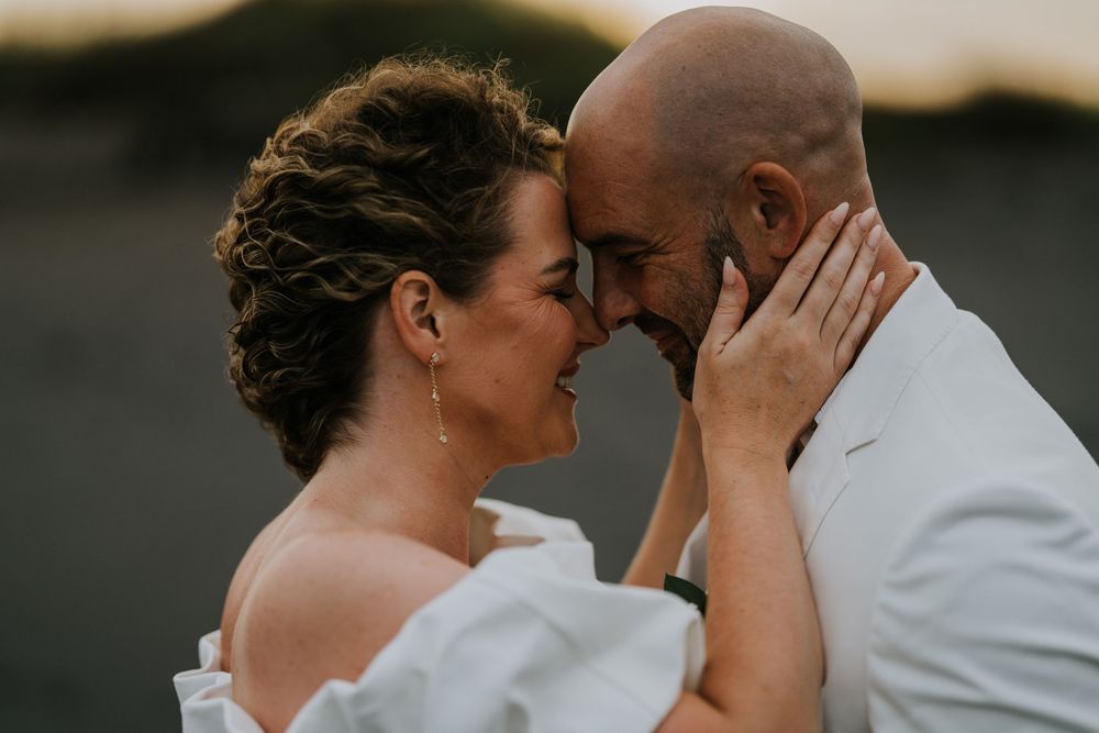 Romantic wedding portraits at The Royal Purnama beachfront resort in Bali.