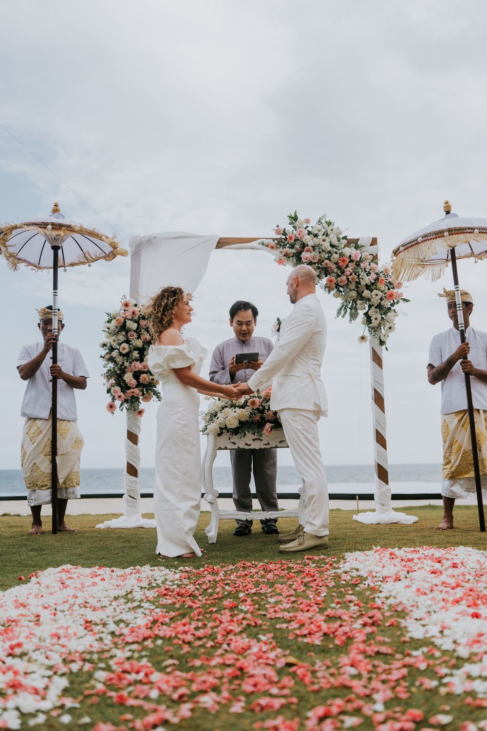 Romantic wedding portraits at The Royal Purnama beachfront resort in Bali.