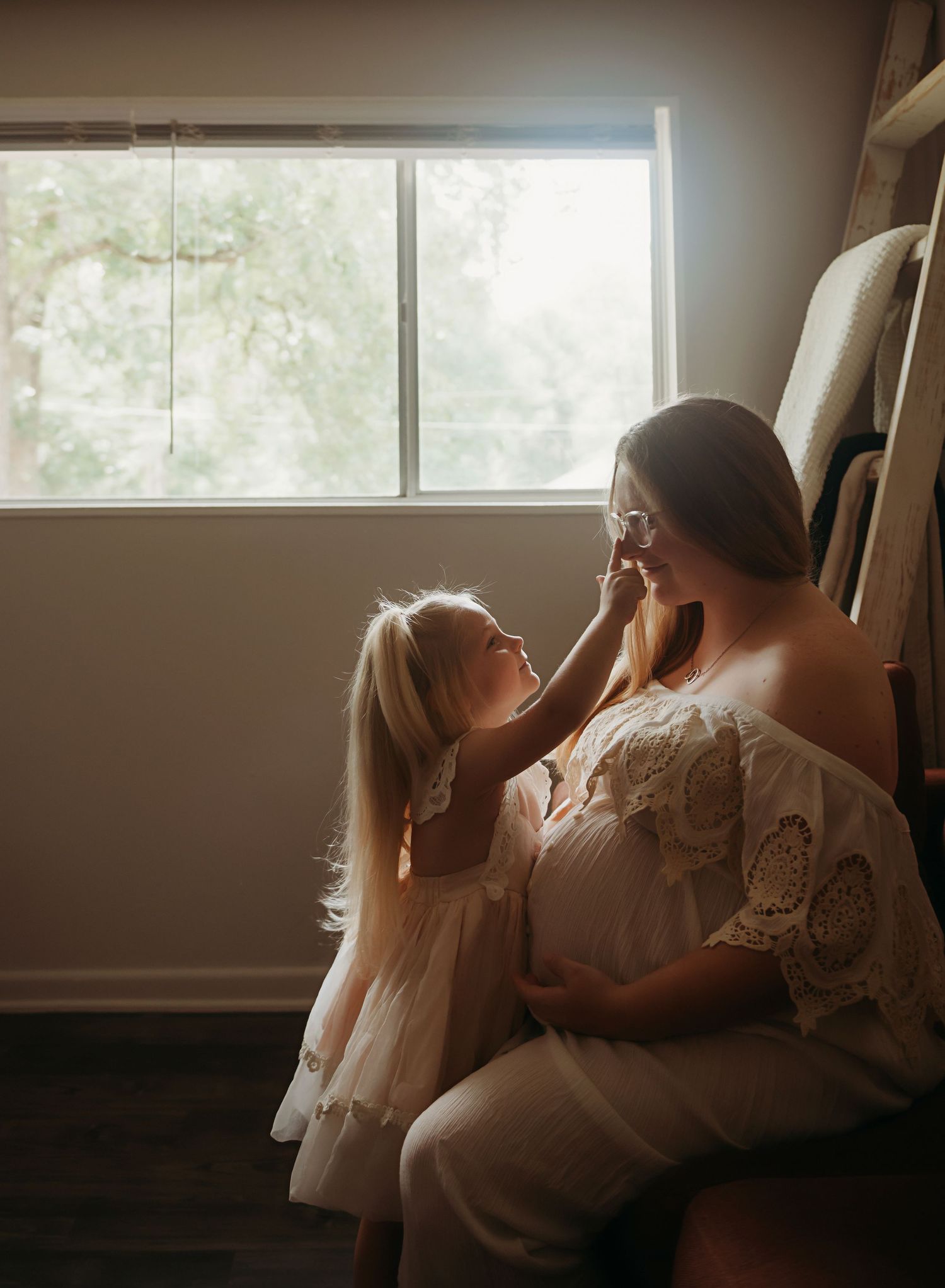 A day in the life maternity sessions shot in your home with the people you love. This session is documentary in nature and stress free.