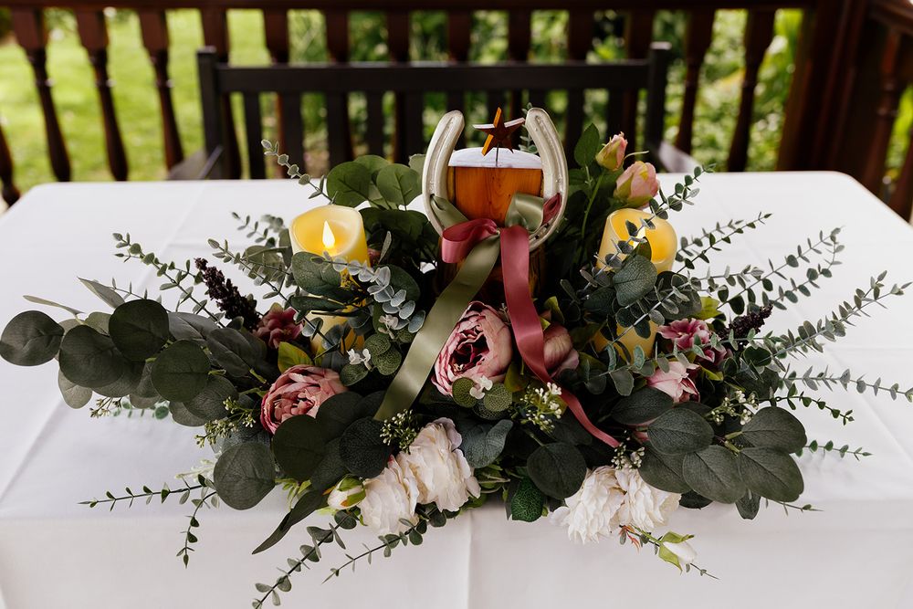 Close up of summer wedding details and bouquets at Briery Wood wedding venue