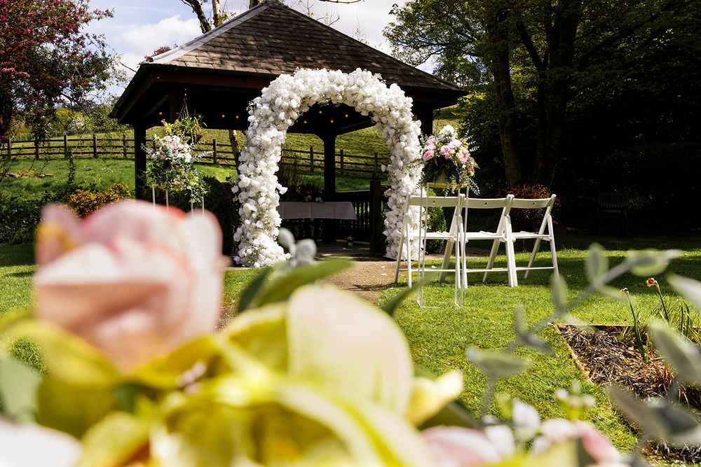 Scenic outdoor wedding photography showcasing the mature woodland gardens at Briery Wood