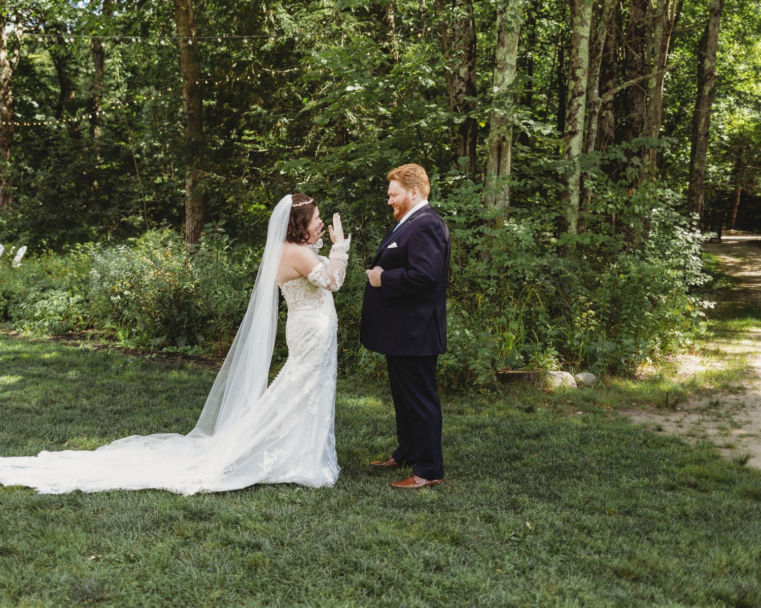 Couple seeing each other before their wedding ceremony during a first look.