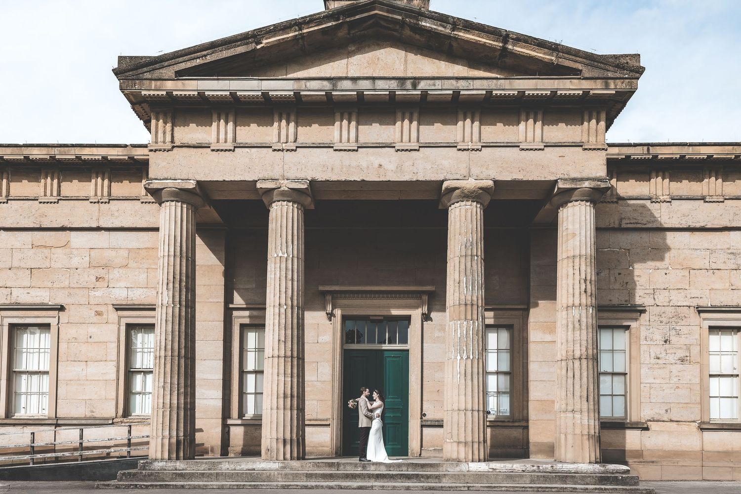 Wedding photographer photographing an engaged couple