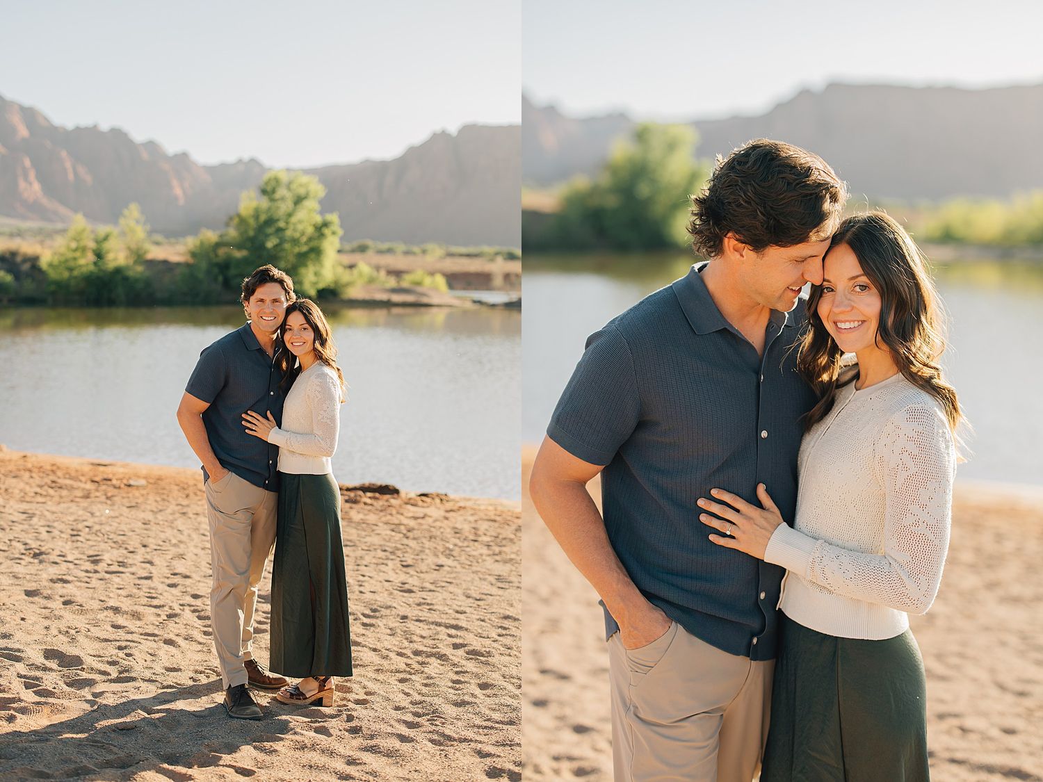 Couple embracing on sandy riverbank with red rock mountains and calm water in warm golden sunlight.
