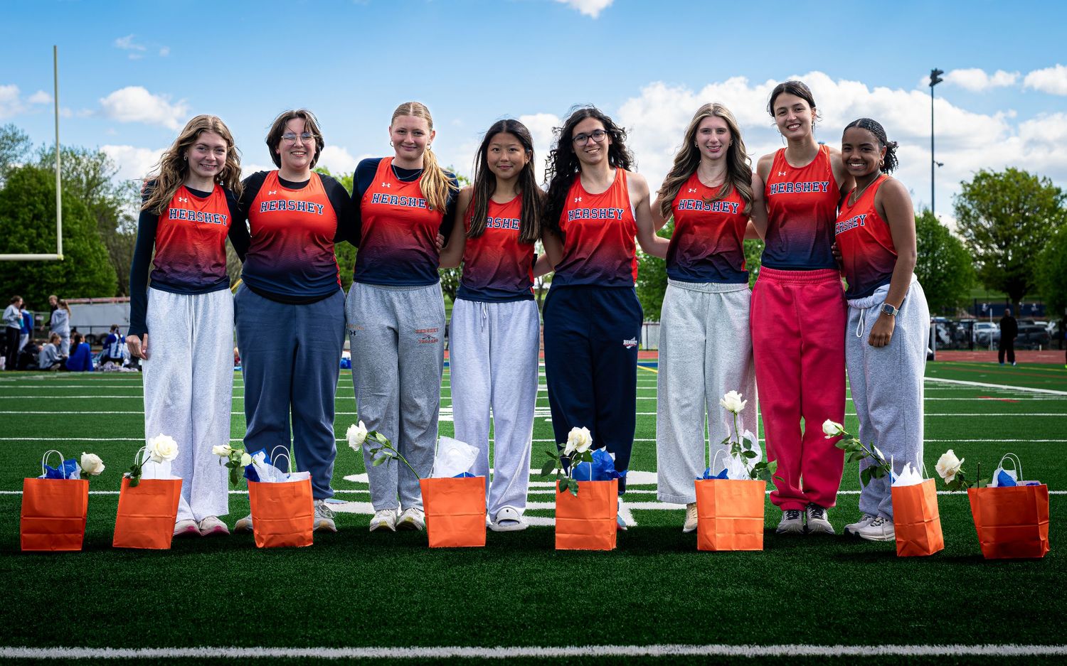 Hershey Trojans track & field athletes at senior night vs. Lower Dauphin, by Deanna Fox, SportsFox Photography, Hershey PA