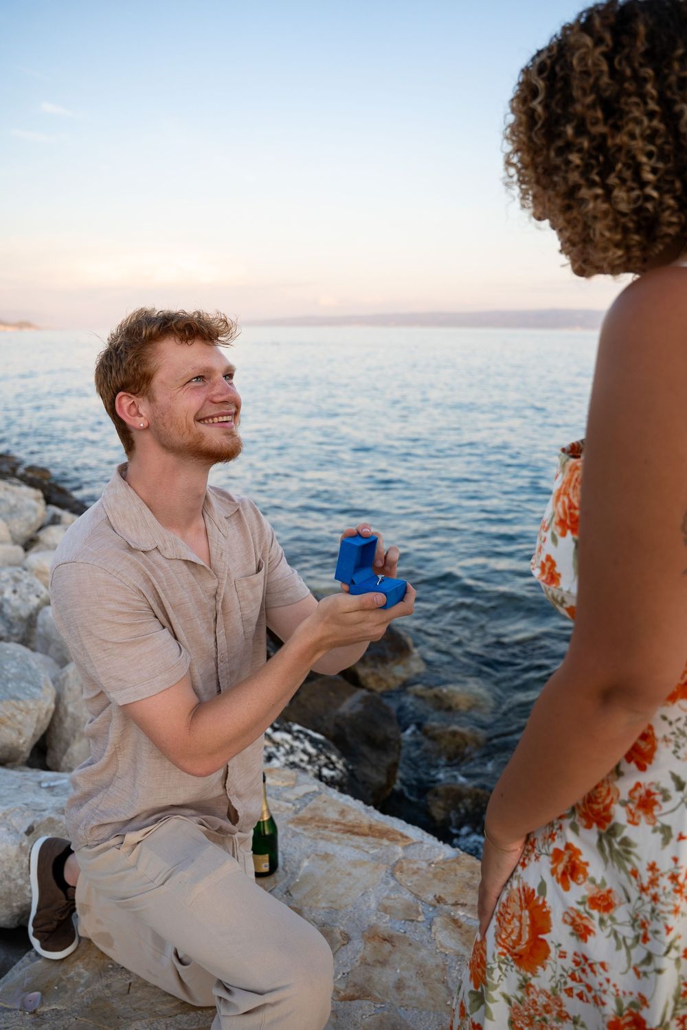 Beach surprise proposal at Žnjan Beach, Split, Croatia captured by Split proposal photographers during a romantic sunset engagement.