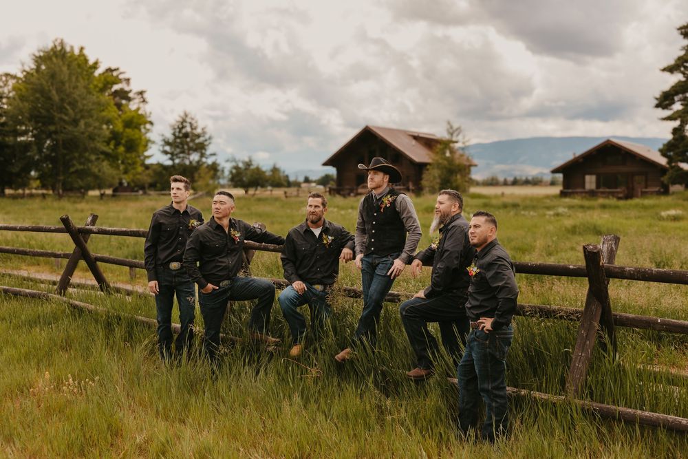 Groomsmen Pose together at Copper Rose Ranch near Emmigrant Montana at a Western Wedding captured by Local Livingston Wedding Photographer
